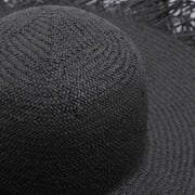 Cappello di paglia intrecciata da donna