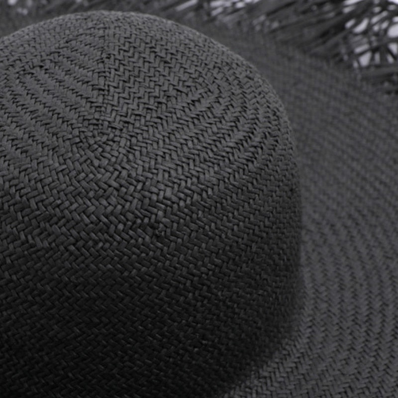 Cappello di paglia intrecciata da donna